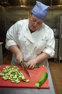 chef prepping food in the kitchen
