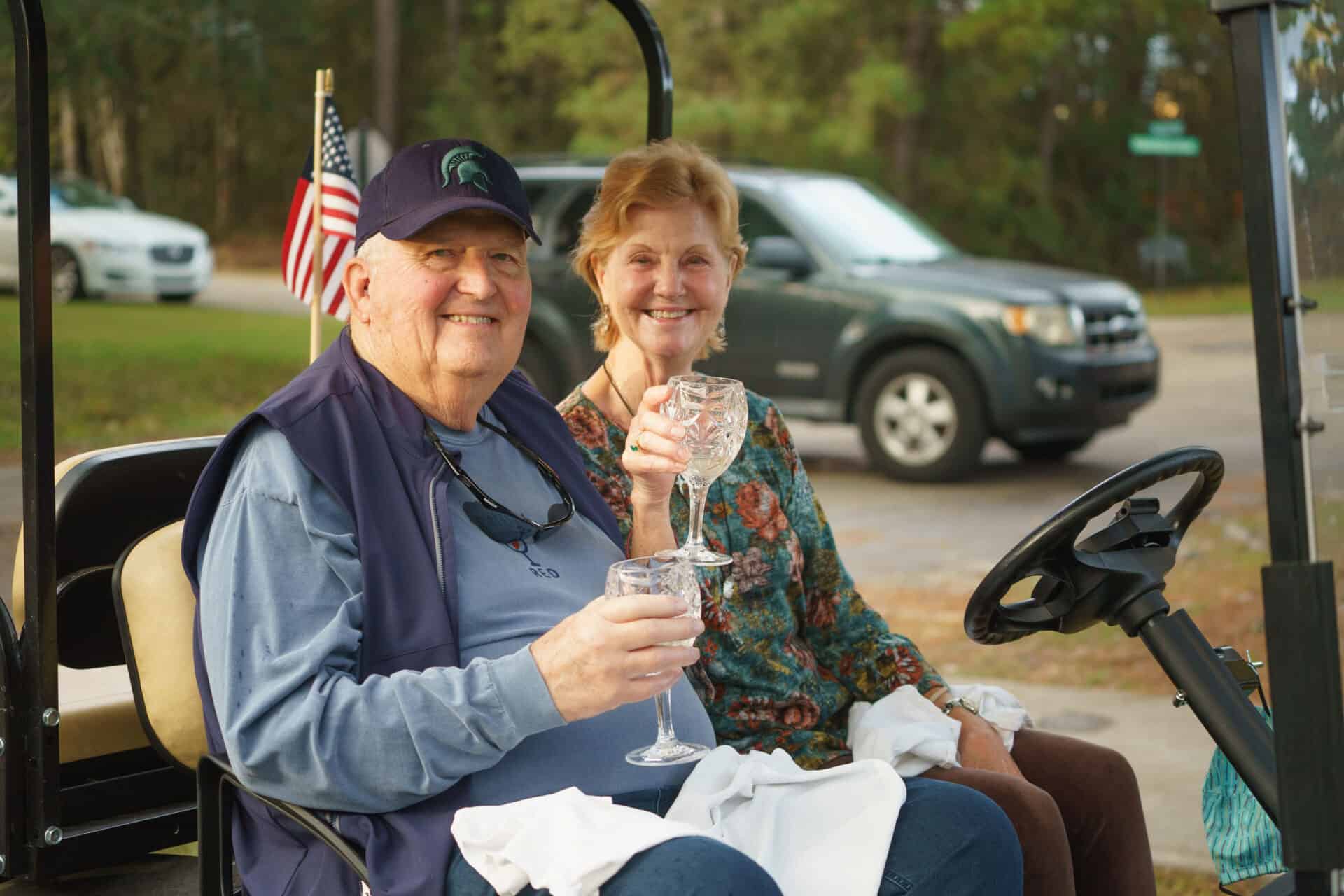 Senior Couple Golf Cart