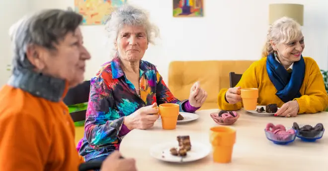 a group of women enjoying a meal