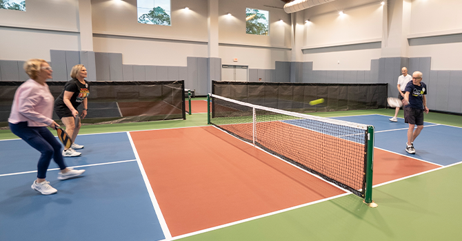 clients playing pickleball